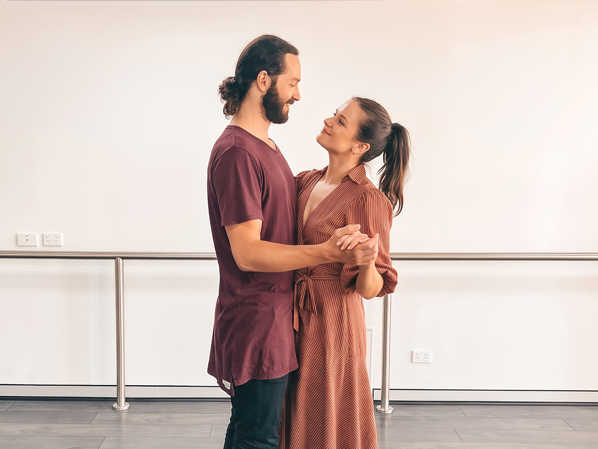 Couple dancing together at SLIQ Studio