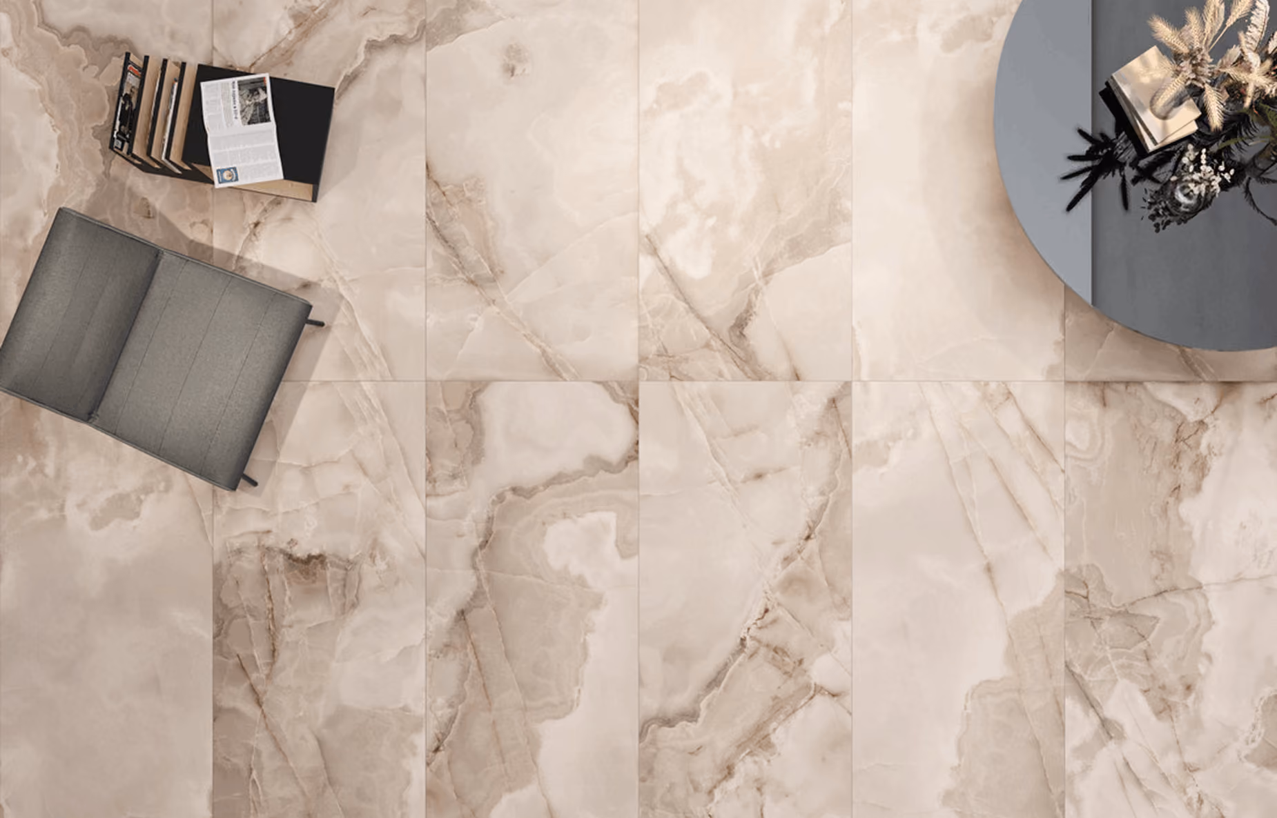 Porcelain tiles in marble and natural-effect finishes