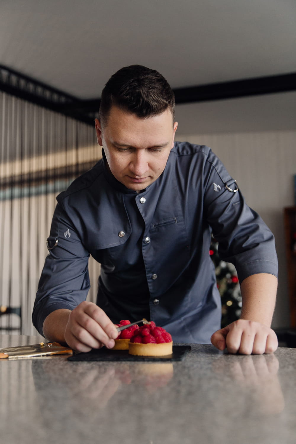 Egor plating a finished dessert