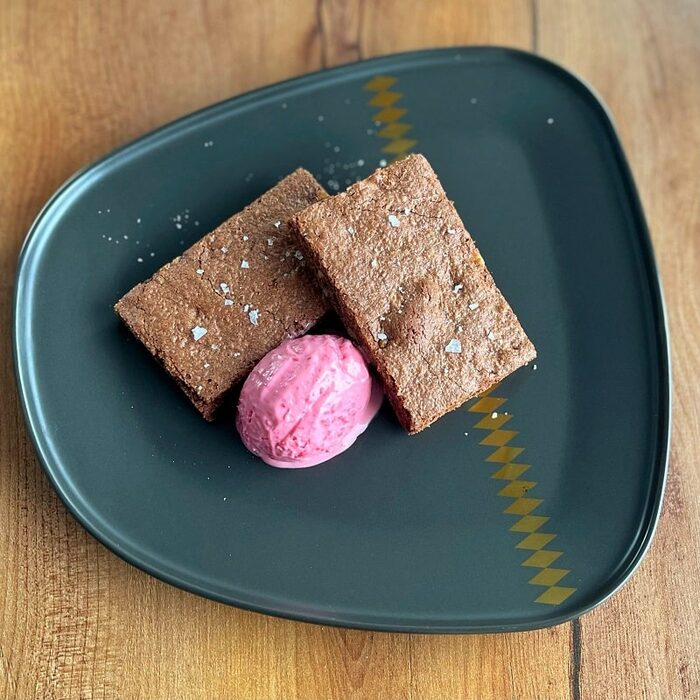 Gluten-free brownie with raspberry ice cream