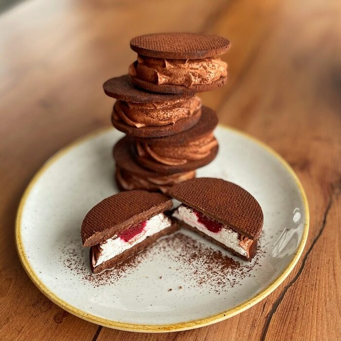 Chocolate zephyr sandwich with raspberry