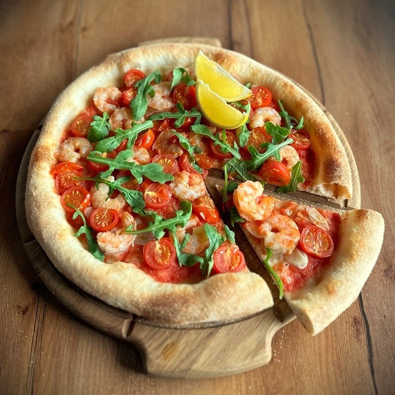 Italian pizza from the course on a thin crisp base