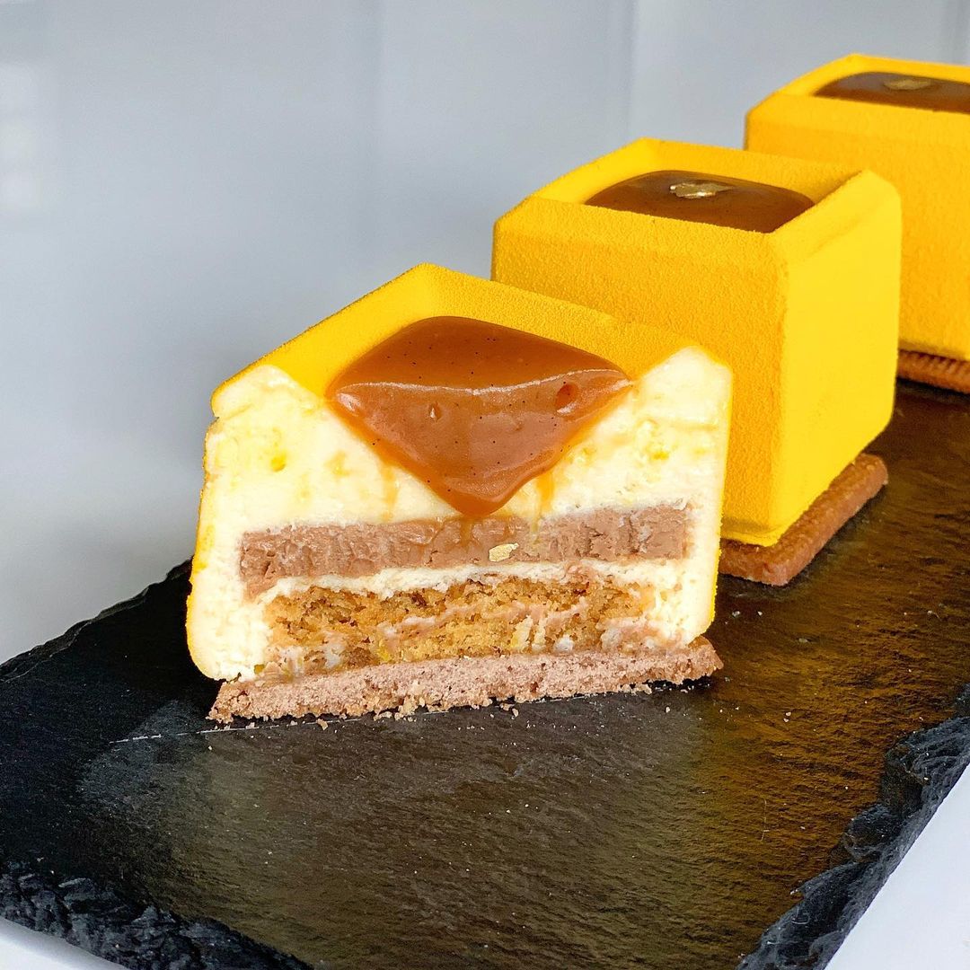 Sliced mousse entremet with clean layers that hold