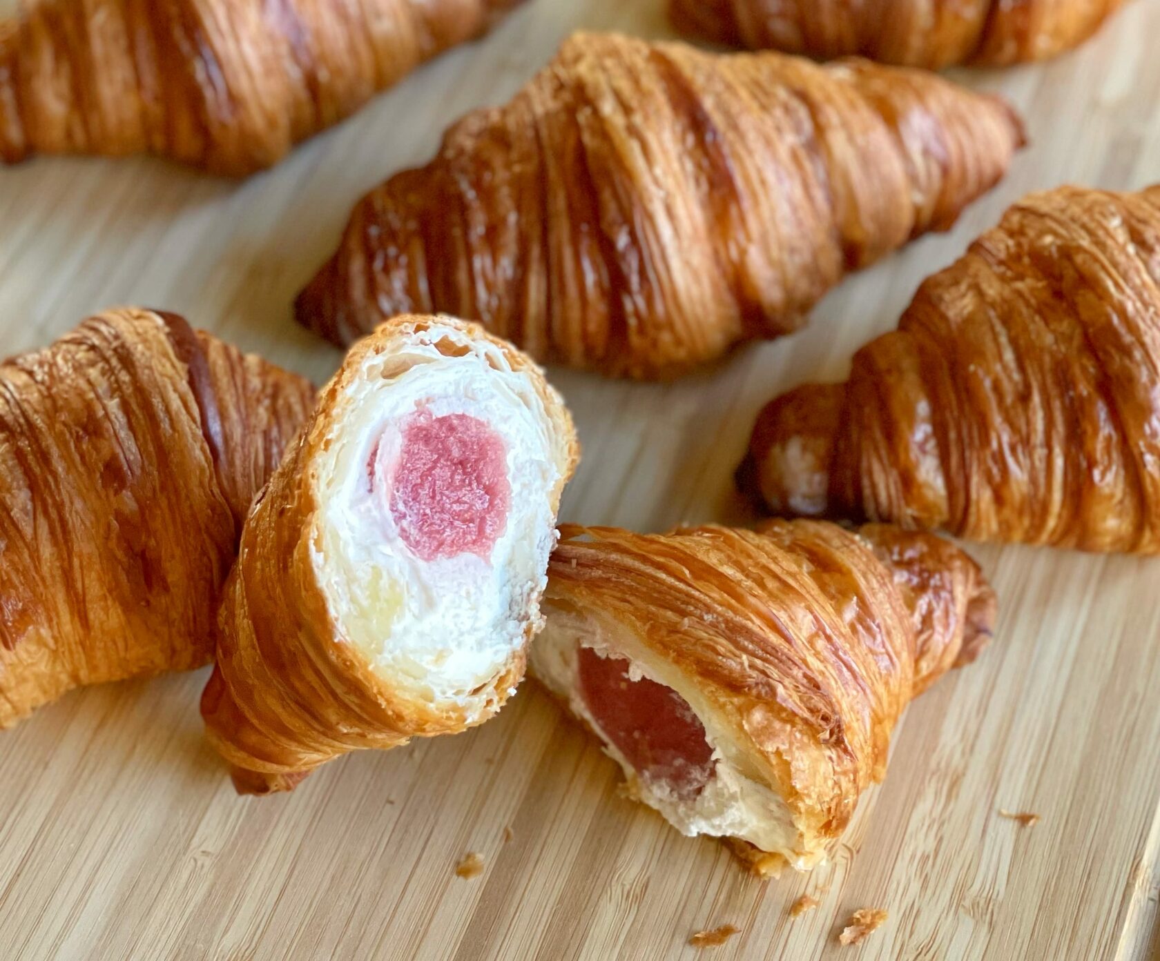 Double-filled raspberry and cheese croissants