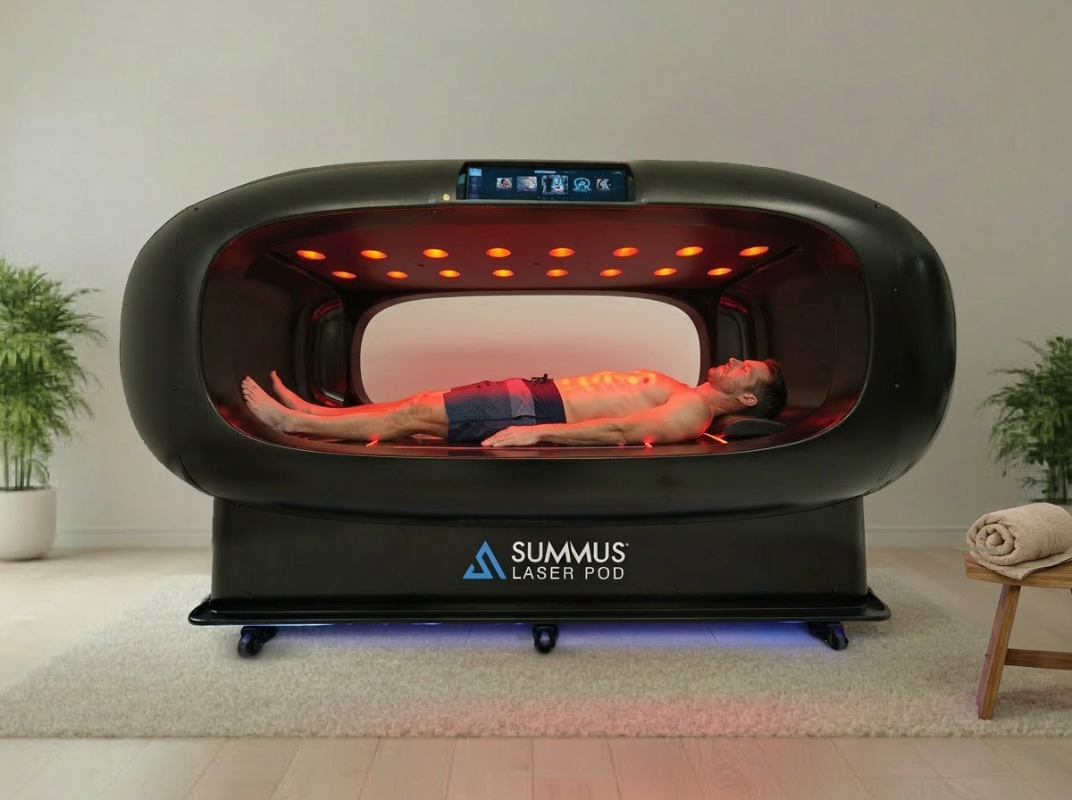 Client relaxing inside the 7 Elements Laser Pod