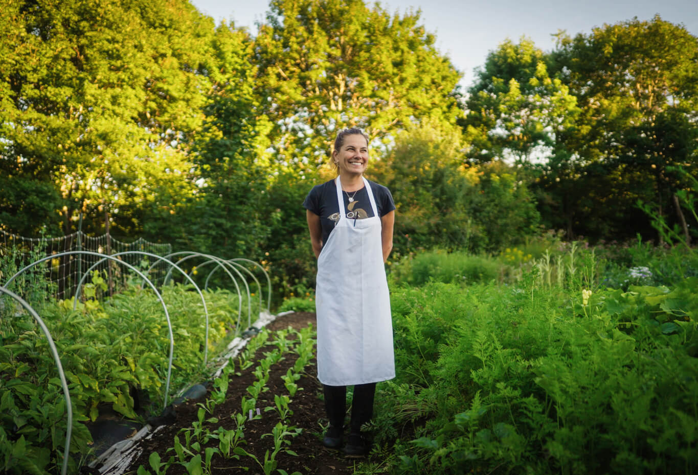 A woman standing in the garden.