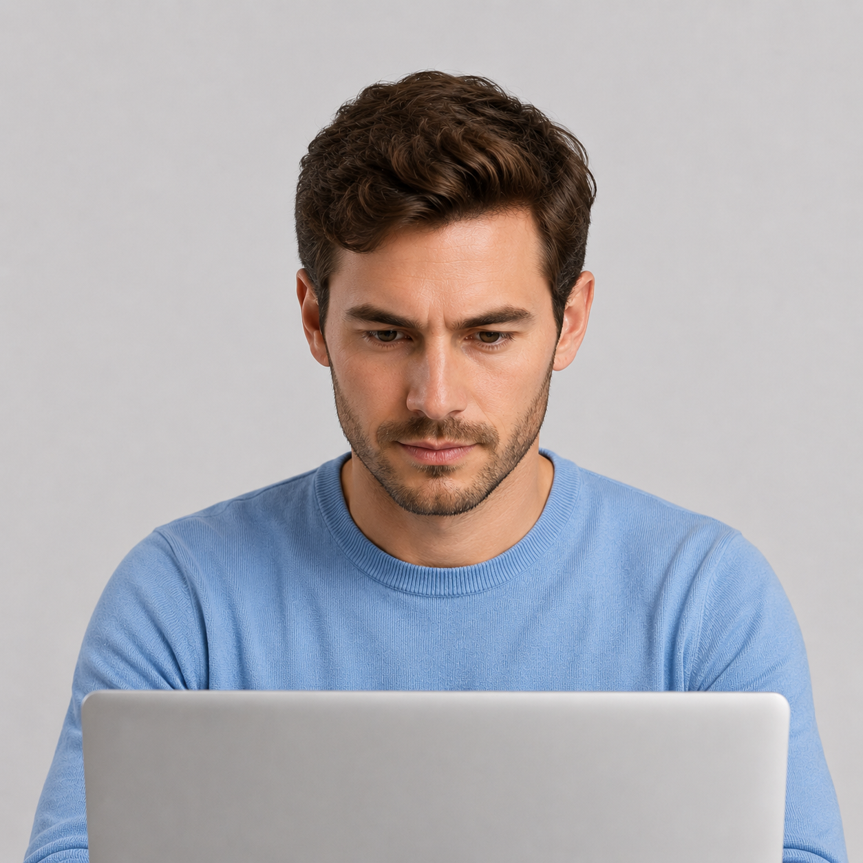 Expert instructor reviewing civilian investigation and OSINT masterclass curriculum on a laptop.