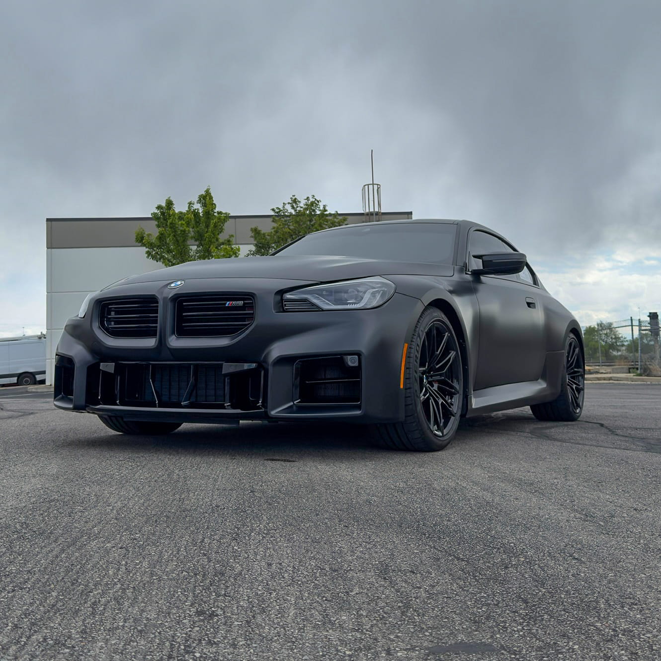 image of a car enthusiast examining a vehicle
