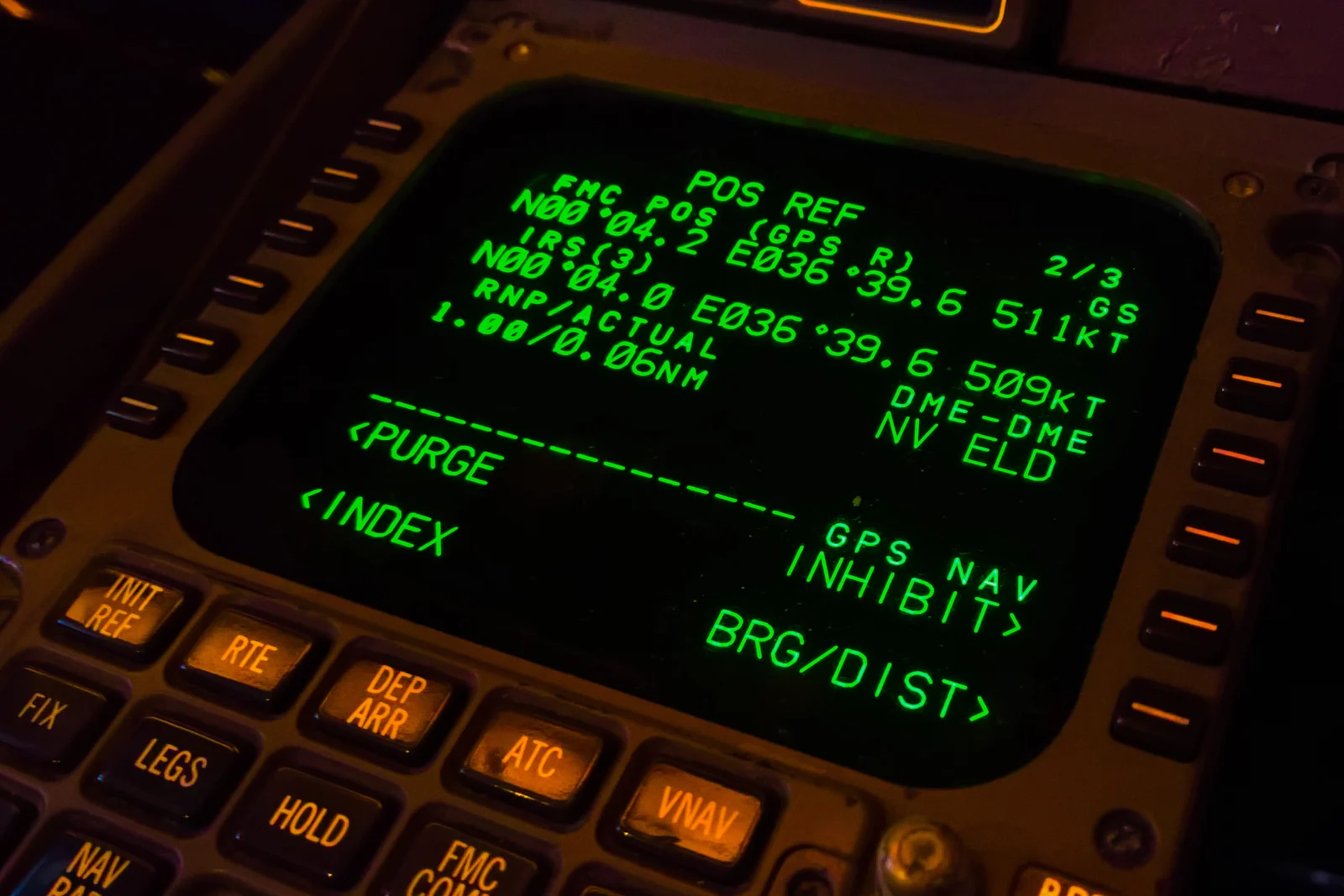 A flight management system CDU being programmed in the cockpit for data link operations