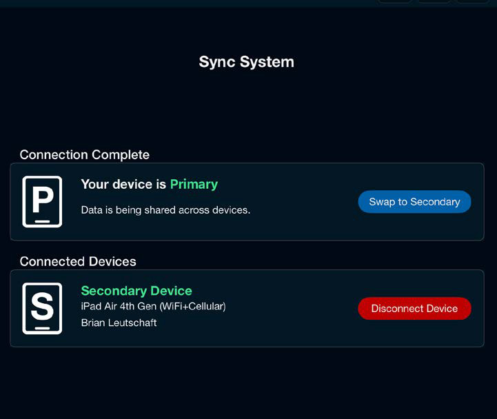 Sync System screen showing Primary and Secondary devices connected