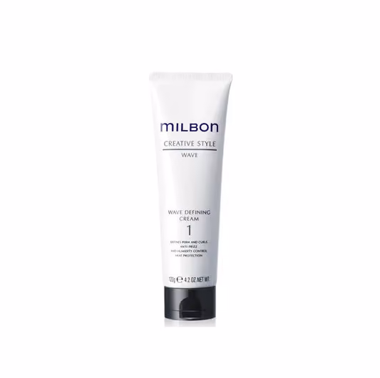 Tube of Milbon Creative Style Wave Defining Cream hair product with black cap on white background.