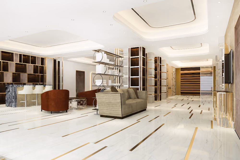 Modern, spacious reception area with white floor, brown and beige furniture, and gold-accented shelves.