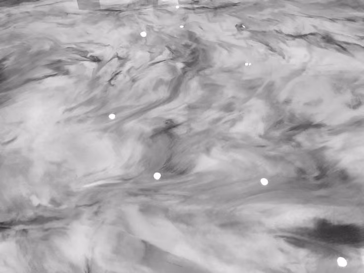 Glossy floor with black and white marble swirl patterns reflecting ceiling lights.