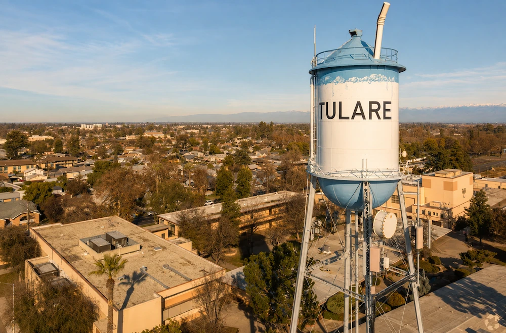 Aerial sunset view of water tower in. tulare, CA