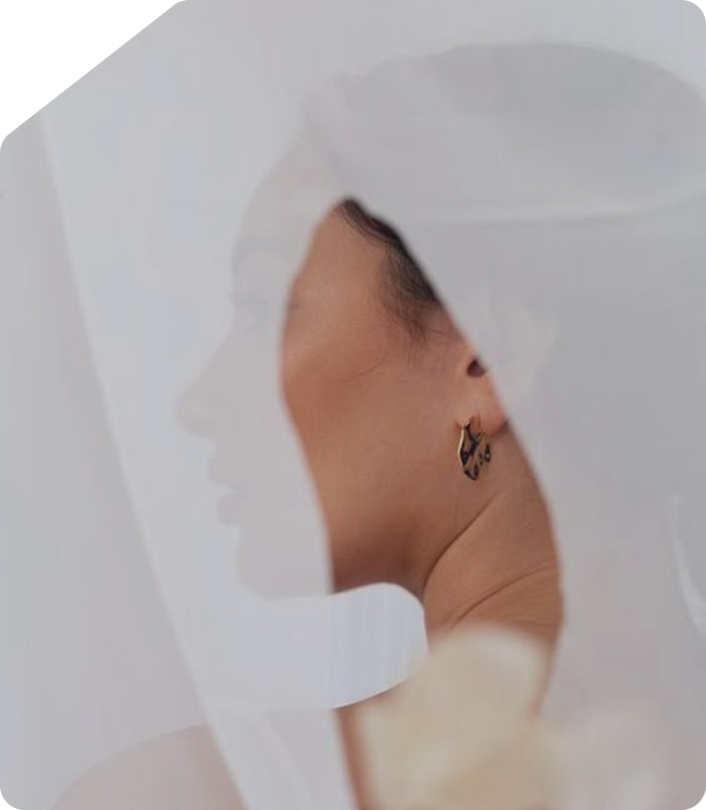 Woman in profile with veil