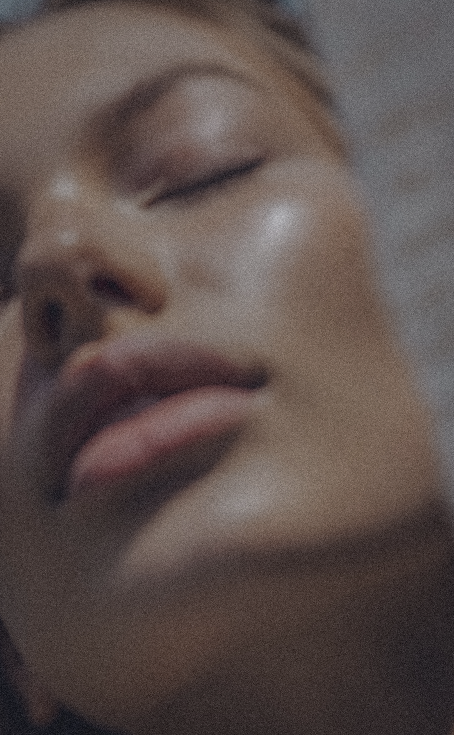 Close-up portrait of woman with eyes closed