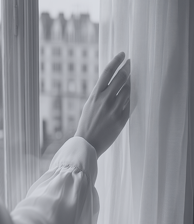 Woman in consultation setting, engaged in conversation