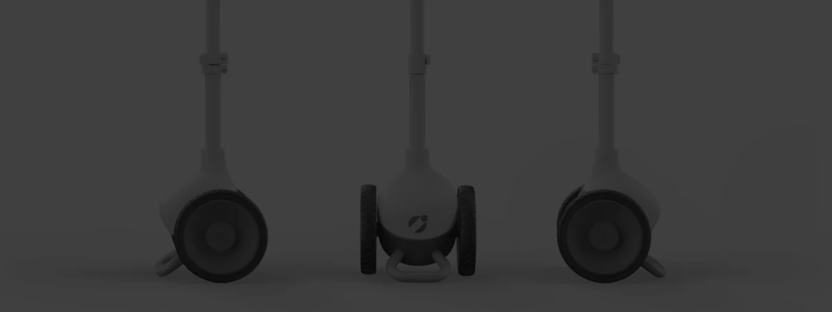 Image of three Glide devices standing on their bumper/kickstands side by side, from the front and left and right-hand perspectives. 