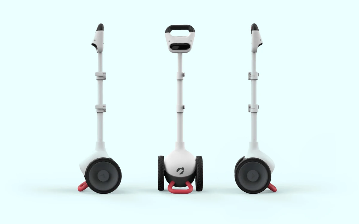 Image of three Glide devices standing on their bumper/kickstands side by side, from the front and left and right-hand perspectives.