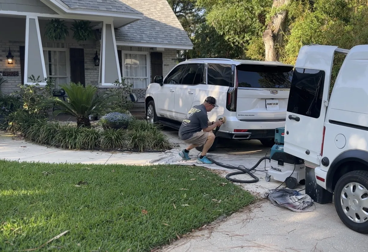 Paint N Go mobile auto body repair technician hand-tinting paint on-site