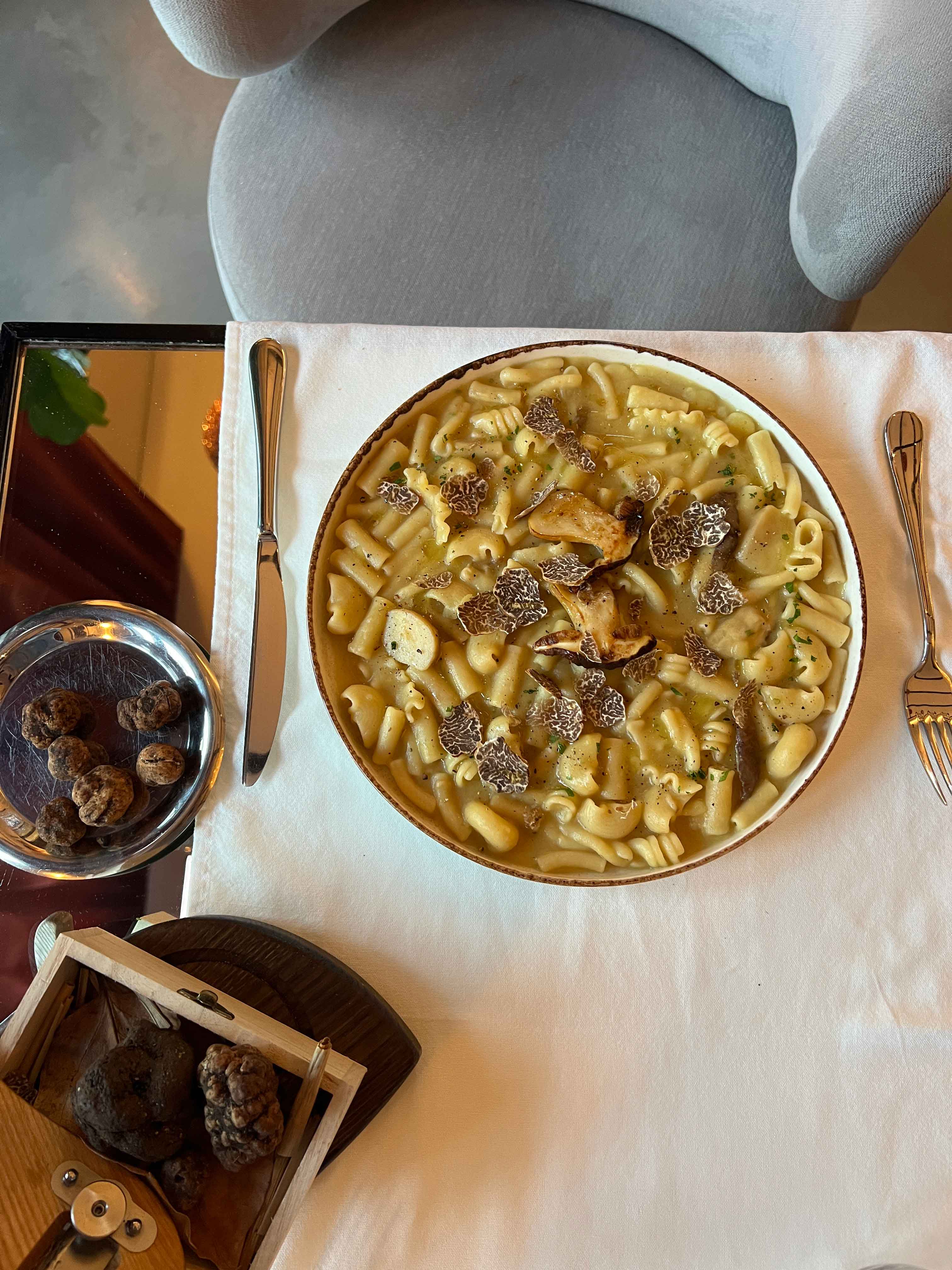 Pasta with mushrooms and Bianchetto truffle slices