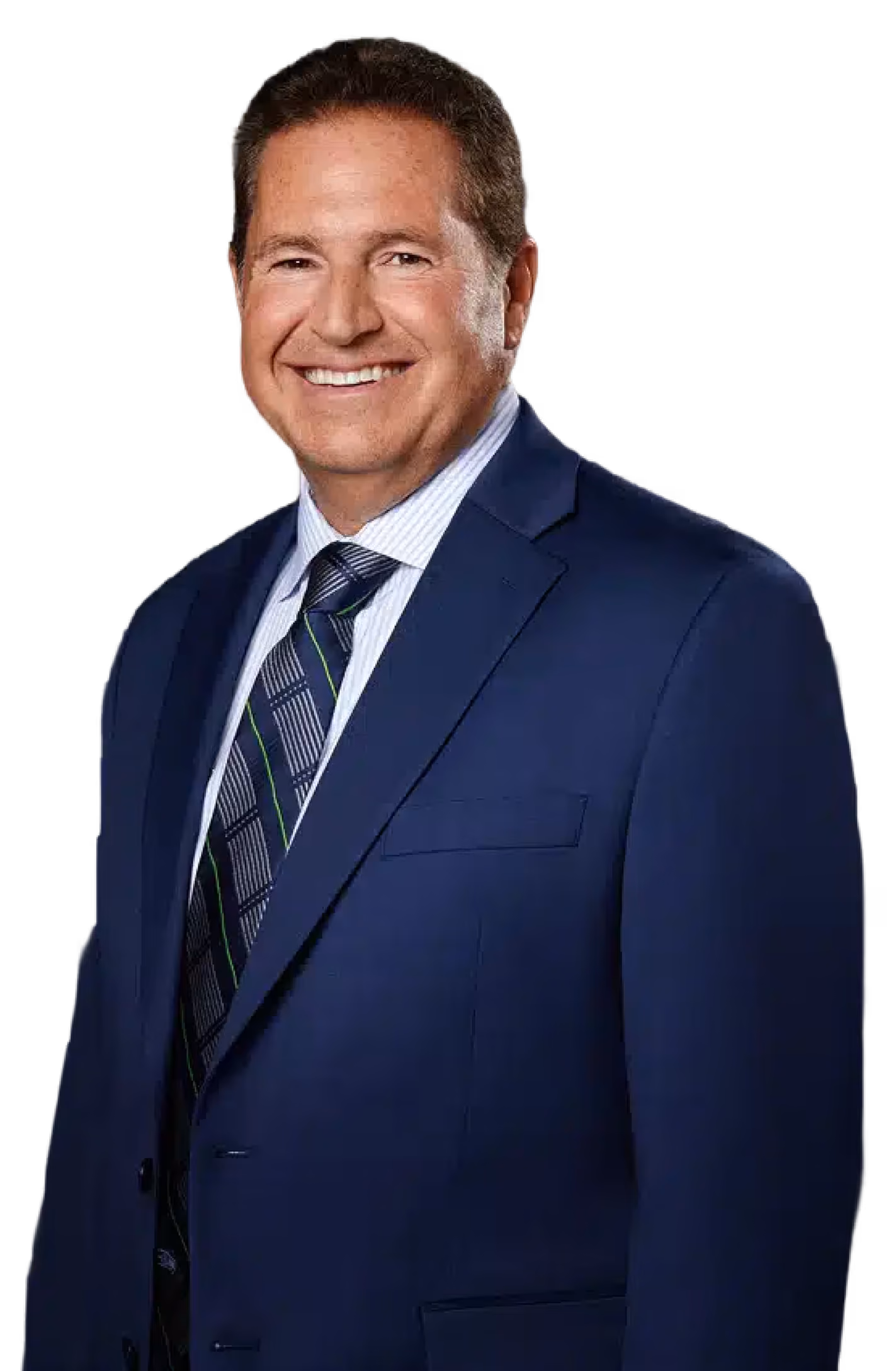 Smiling man wearing a blue suit jacket, striped light blue shirt, and patterned tie against a black background.