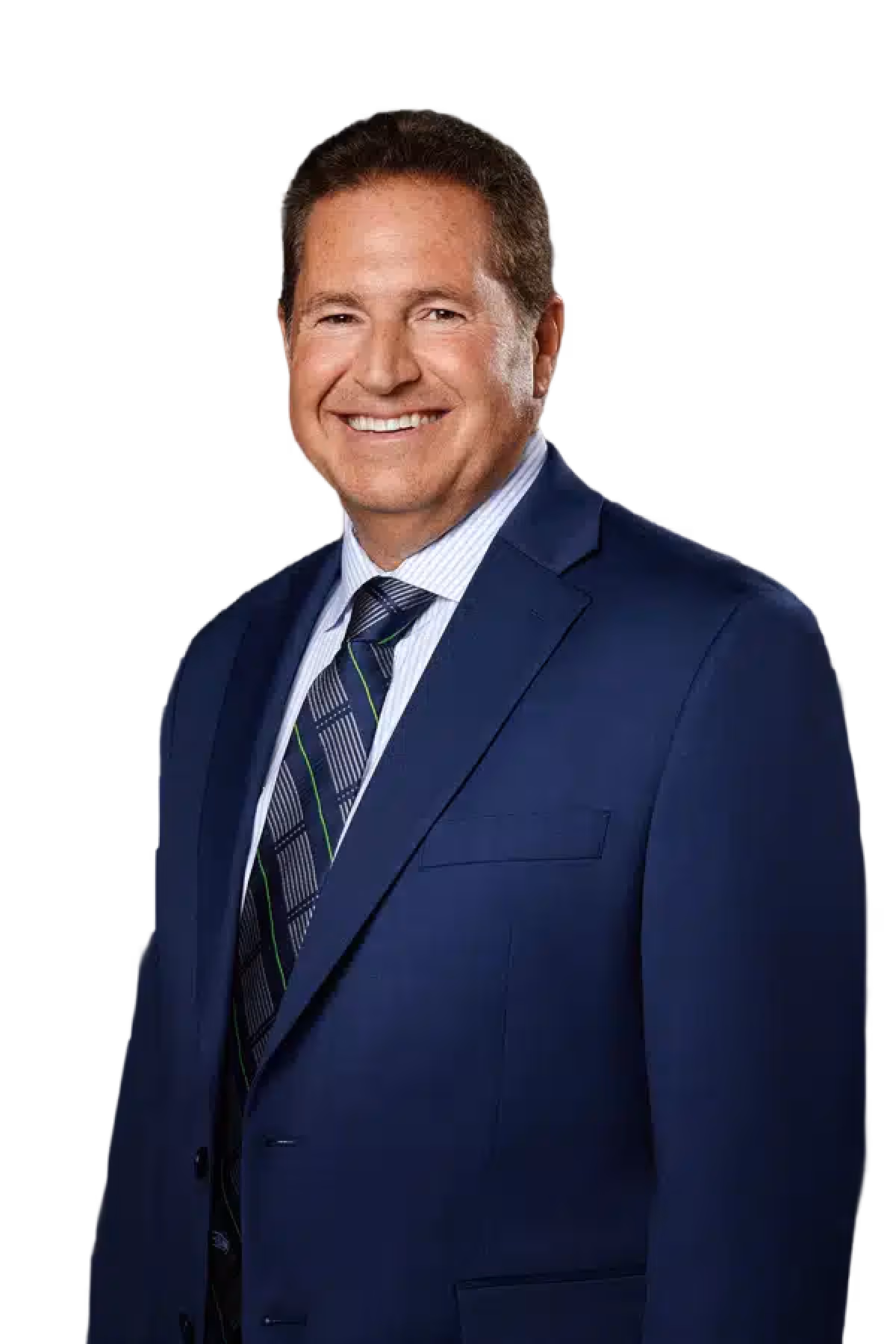 Smiling man wearing a blue suit jacket, striped light blue shirt, and patterned tie against a black background.