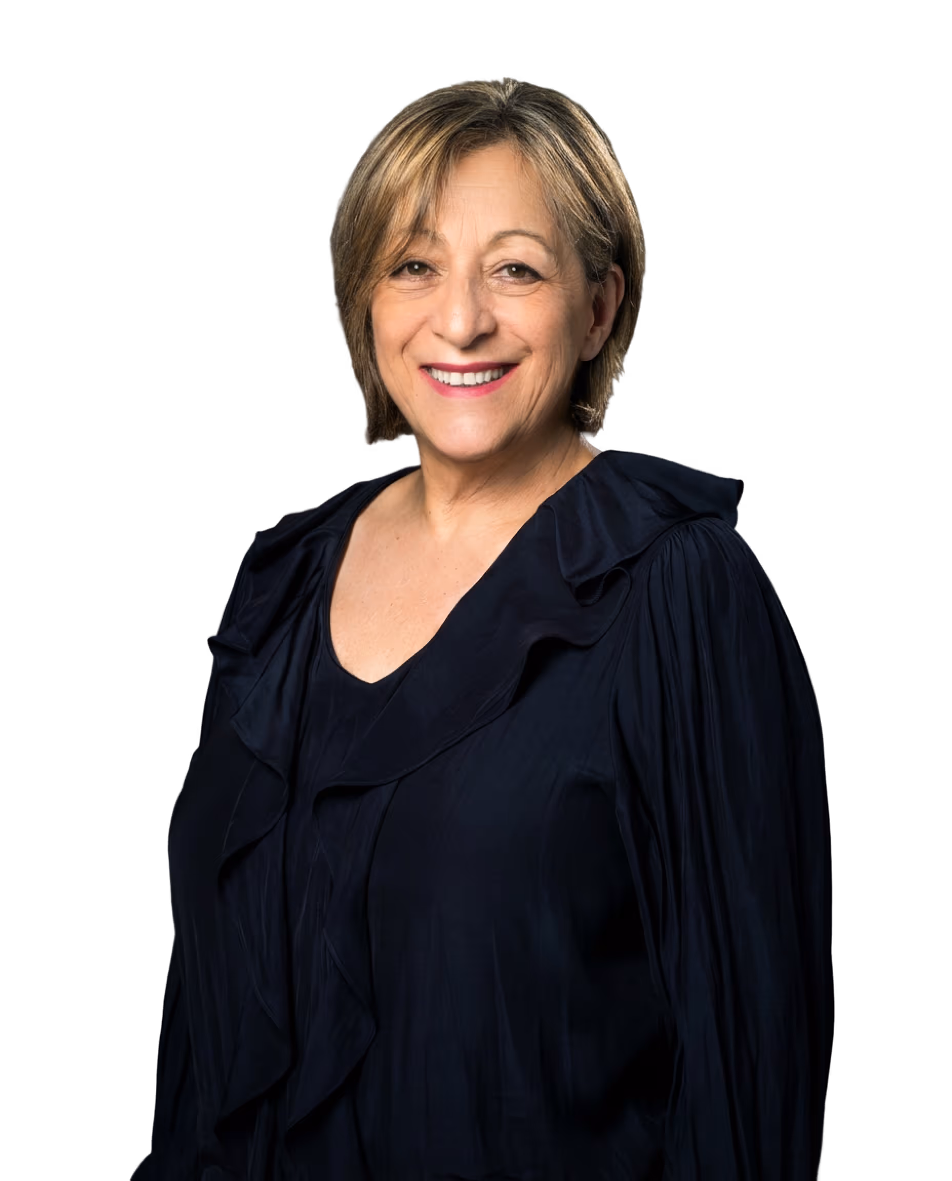 Smiling middle-aged woman with short blonde hair wearing a black blouse against a black background.