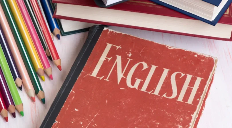 English book and pencils