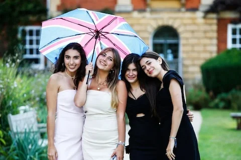 oxford summer students with umbrella