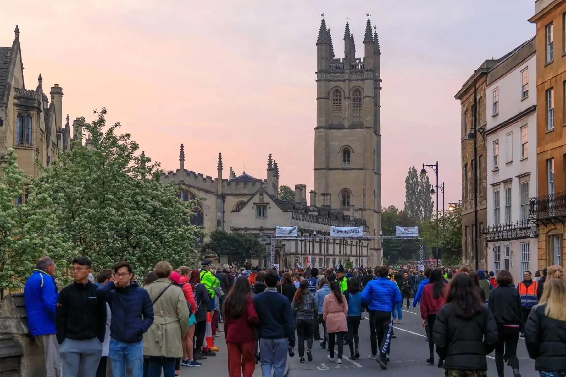 Lots of people walking on the street celebrating May