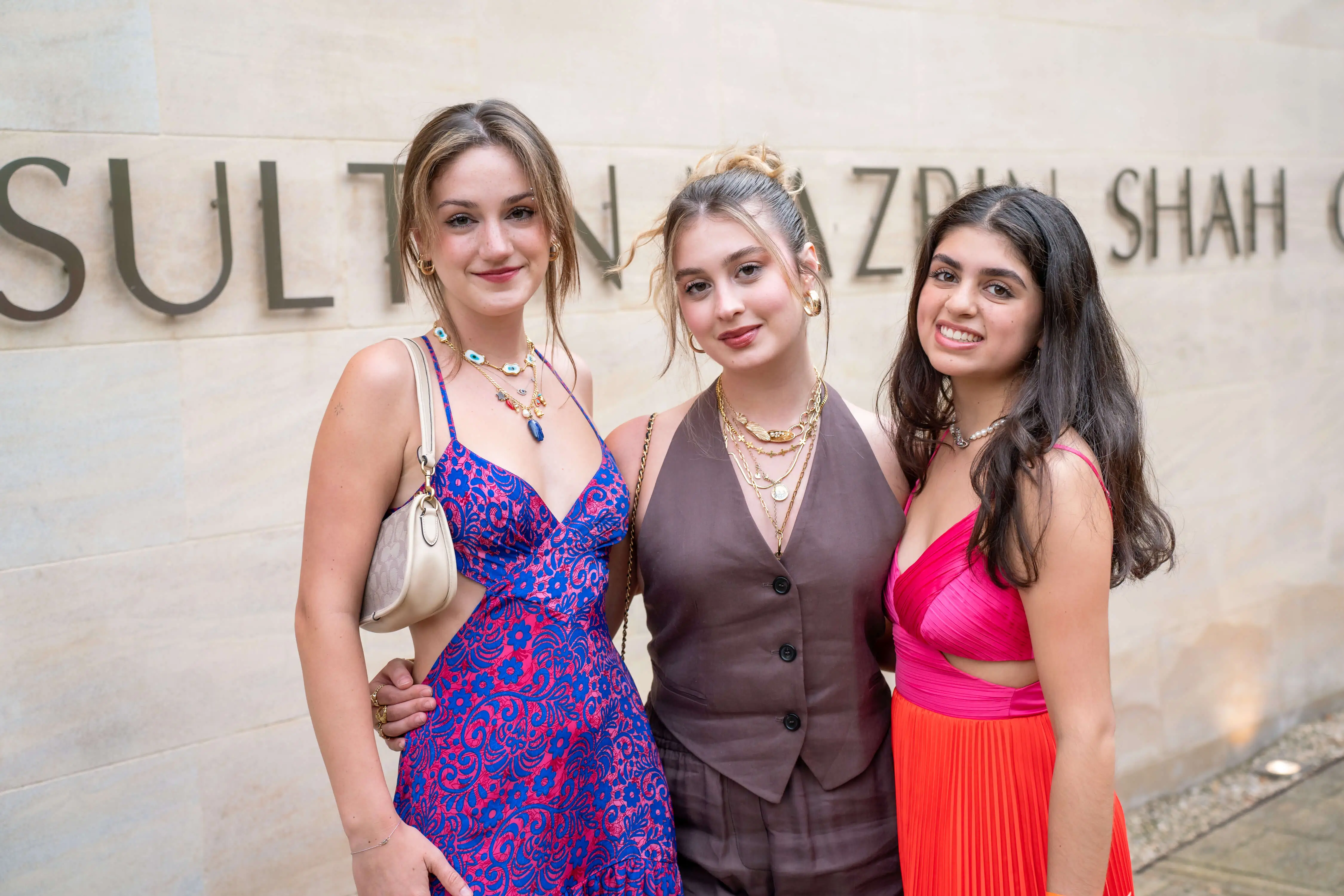 three students outside oxford college