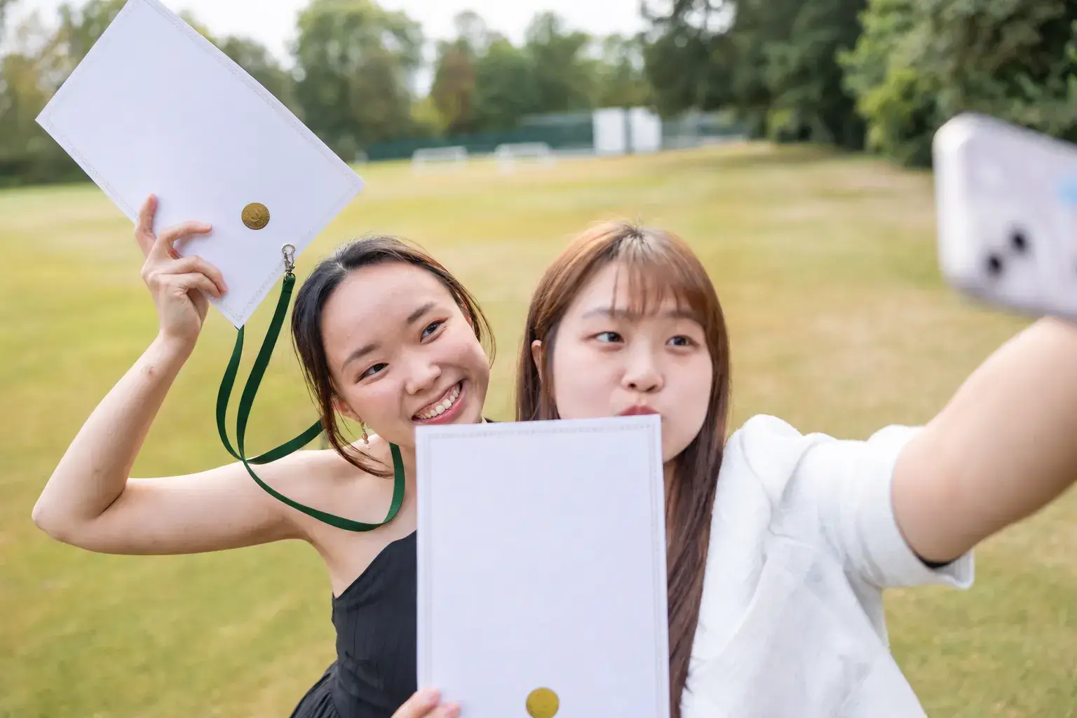 students graduating at college
