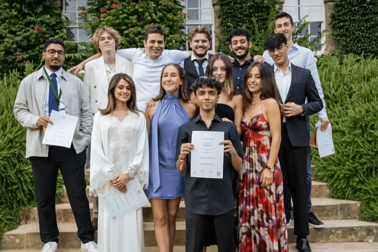 students graduating outside oxford college grounds