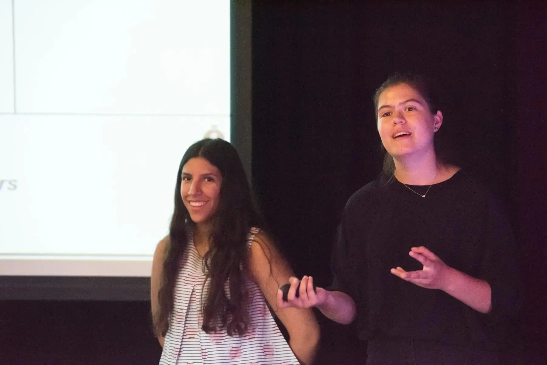 Two girls giving a presentation