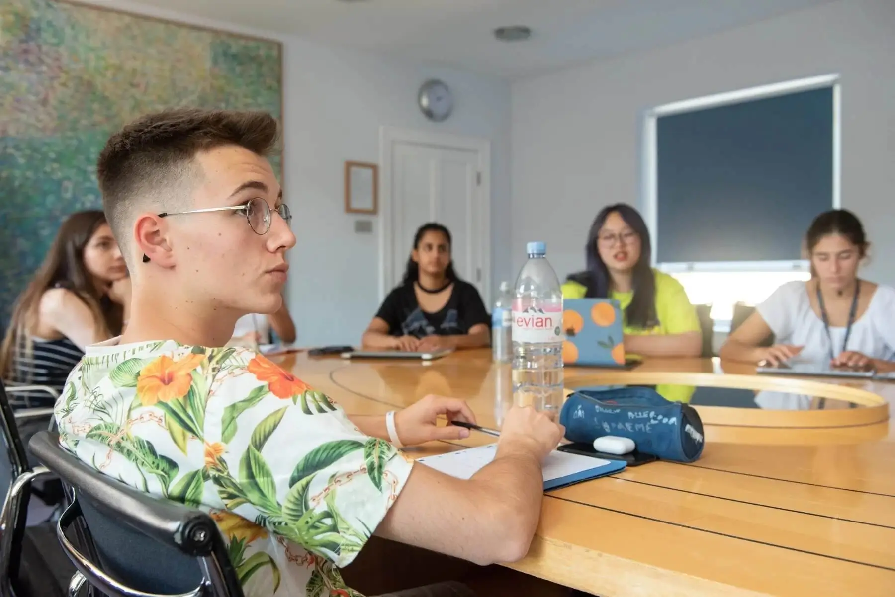 Students in classroom listening to a lecture
