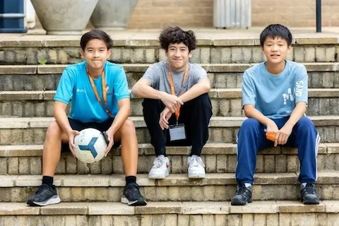 Boys sitting on the stairs