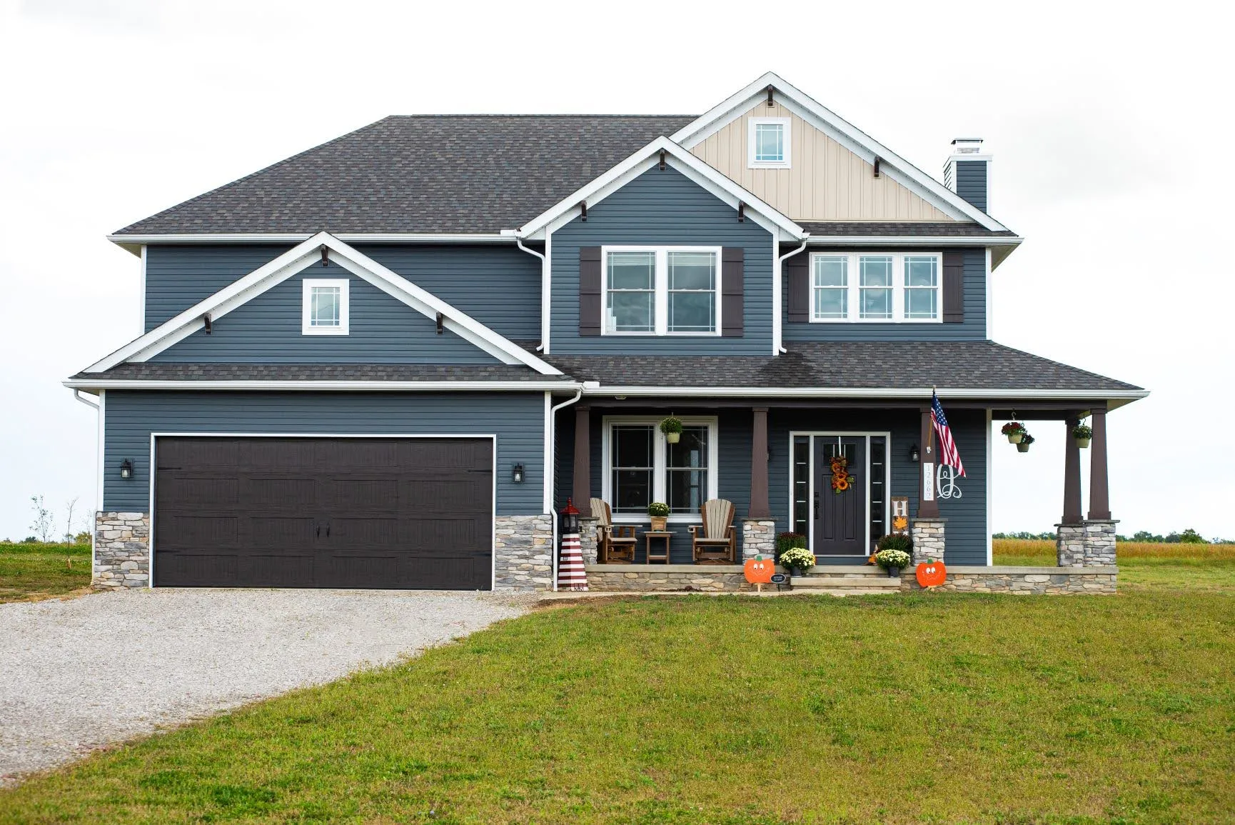 blue siding home with front porch