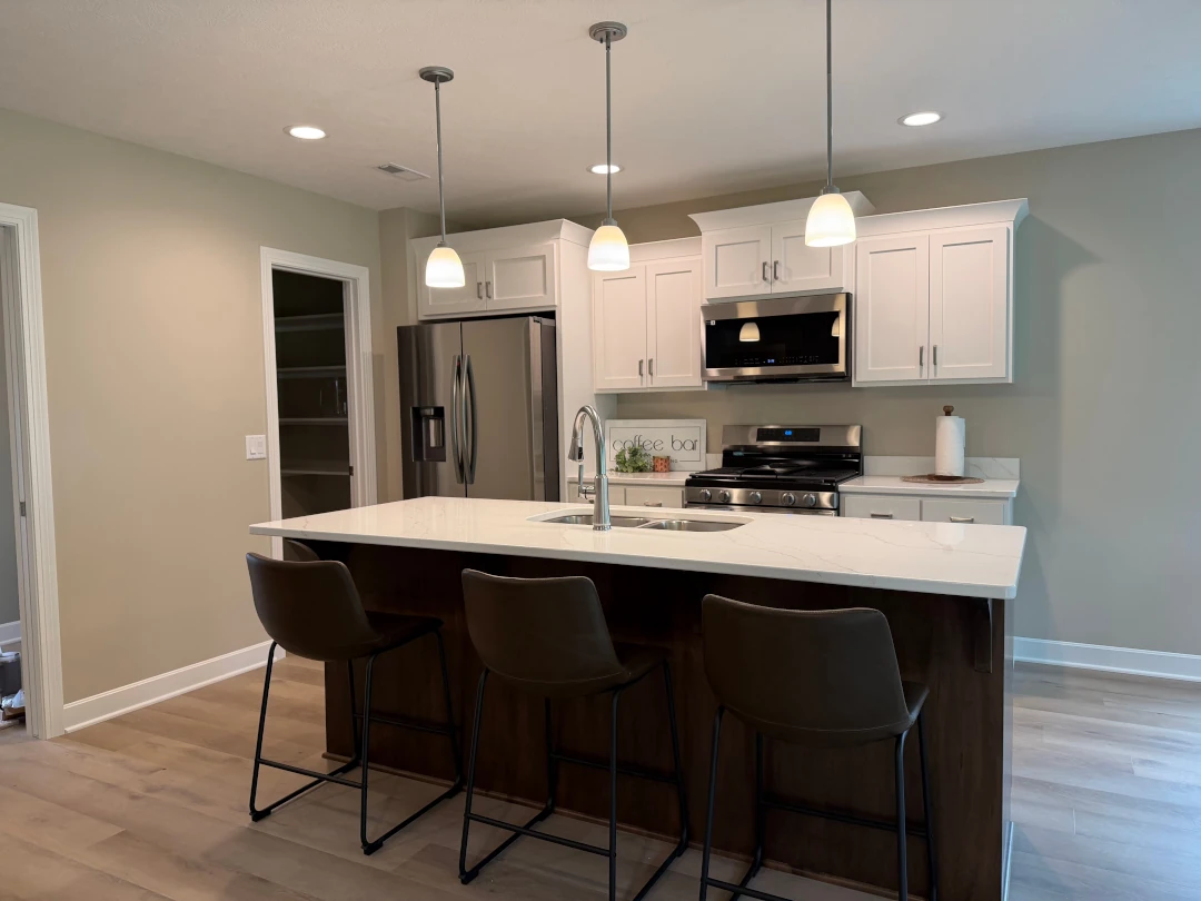 open kitchen area with bar seating