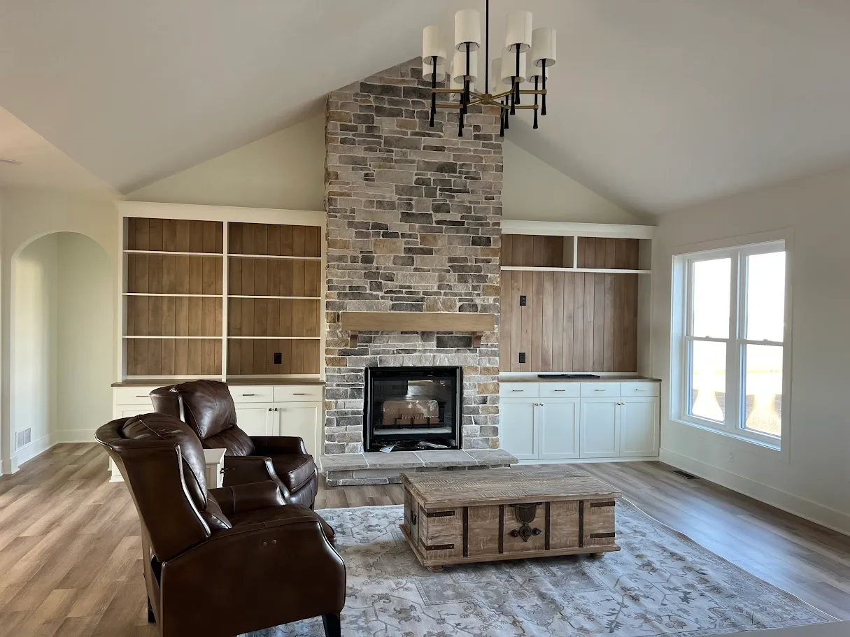 home with fireplace in den
