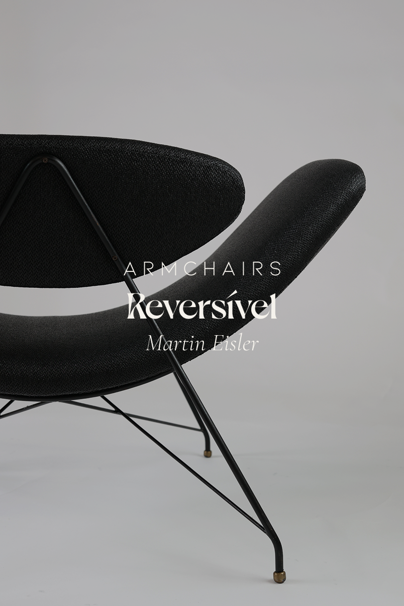 Reversível armchair by Martin Eisler and Carlo Hauner - full front view showing its curved black seat and iron frame