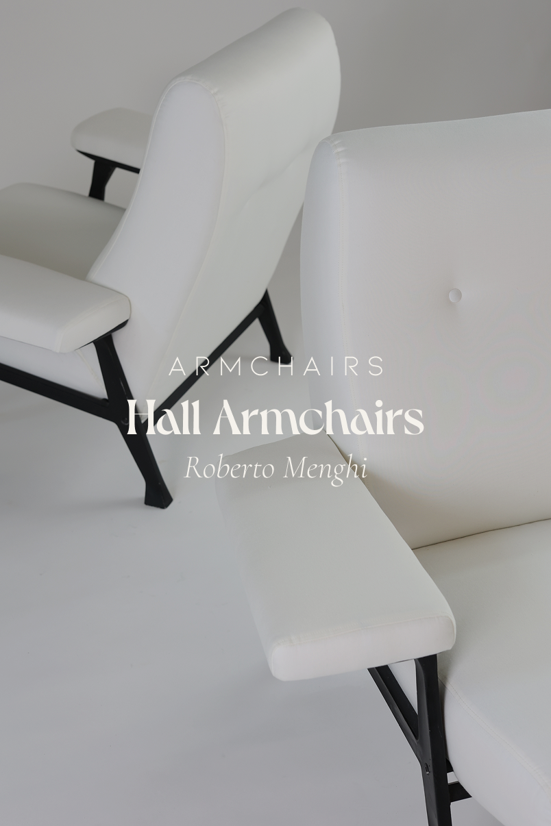 Hall armchair by Roberto Menghi - full front view featuring white upholstery and a black metal frame on a light background