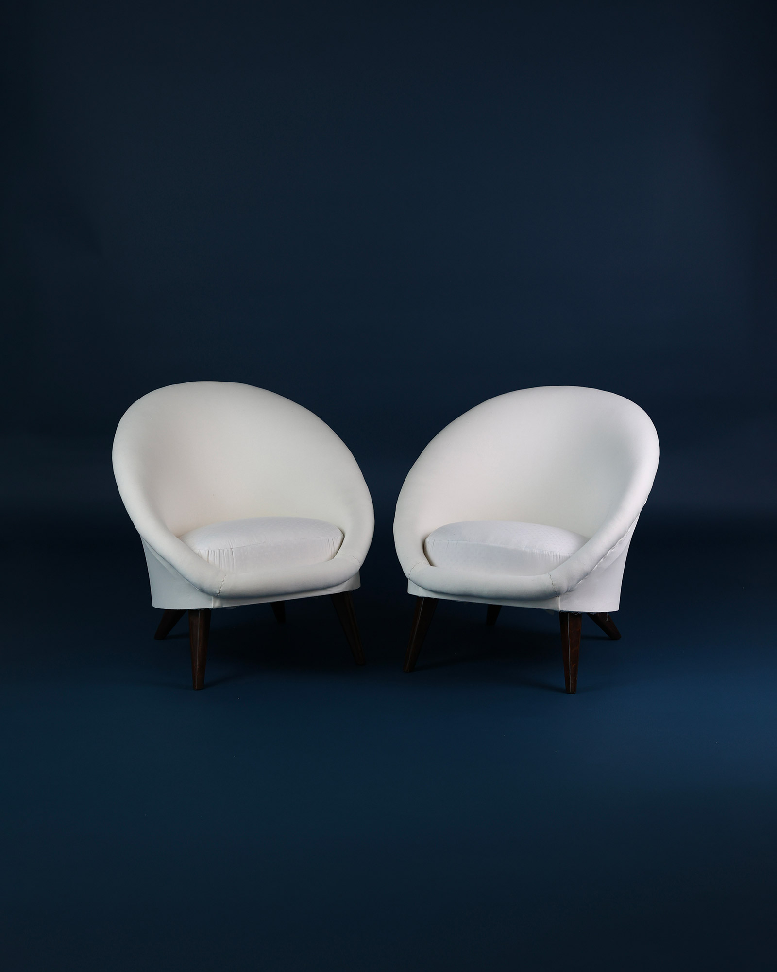 Pair of egg armchairs side by side