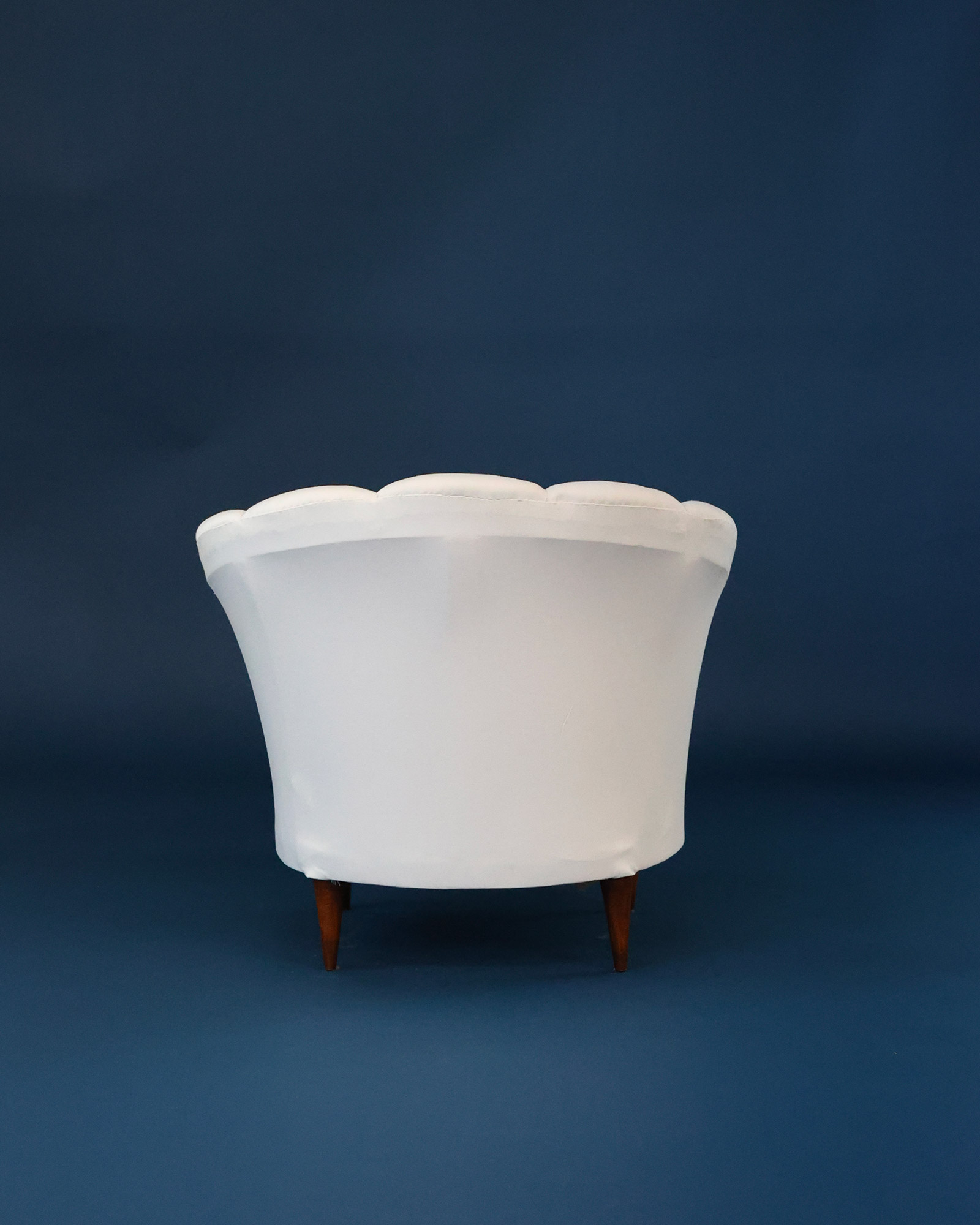 1950s Italian armchair by Gio Ponti - detailed view showcasing the plush rounded back and structure