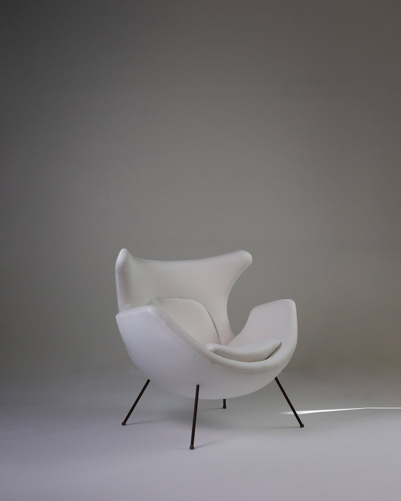 Mid-century modern armchair by Martin Eisler and Carlo Hauner - three-quarter perspective highlighting the seat depth and slender legs