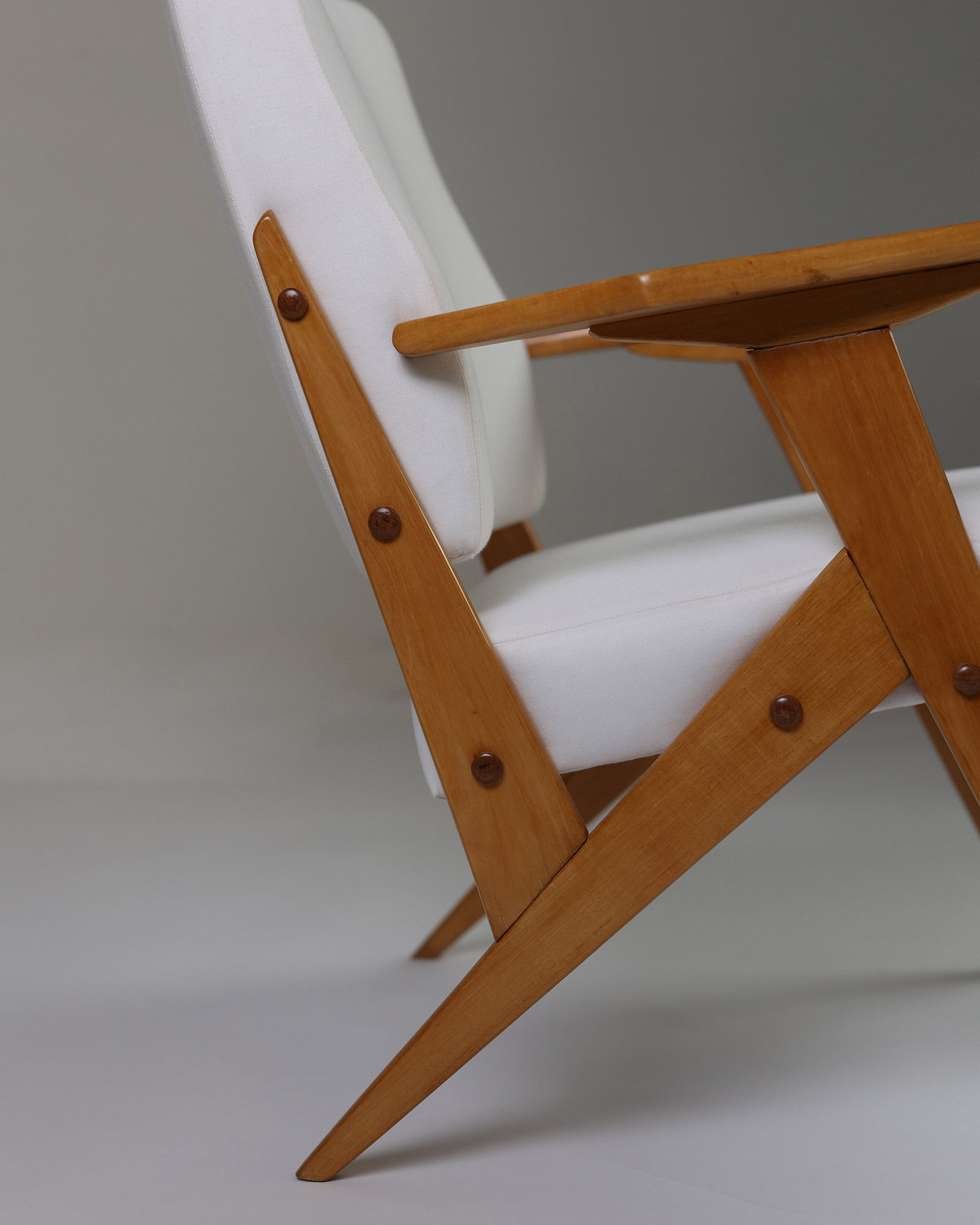 Pair of armchairs by José Zanine Caldas - close-up detail of the wooden joint construction and side profile