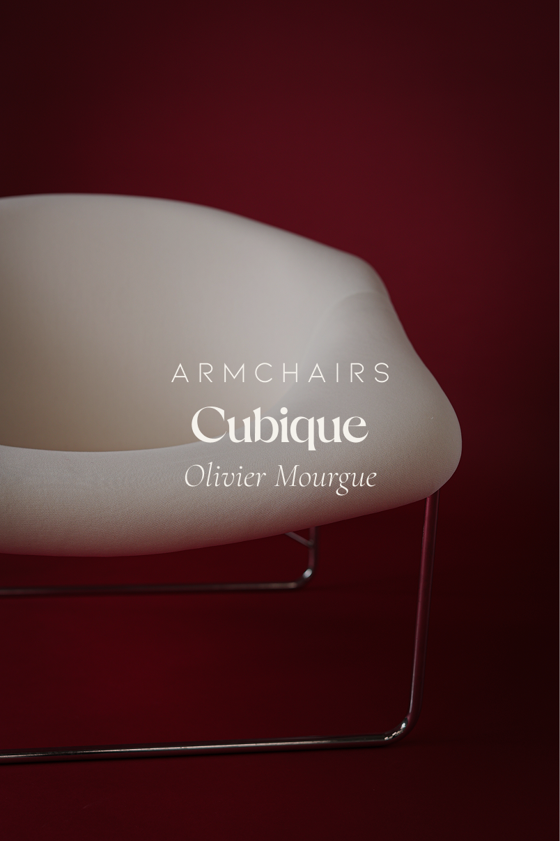 Cubique armchair by Olivier Mourgue - full front view with white seat shell and tubular metal frame on a red background