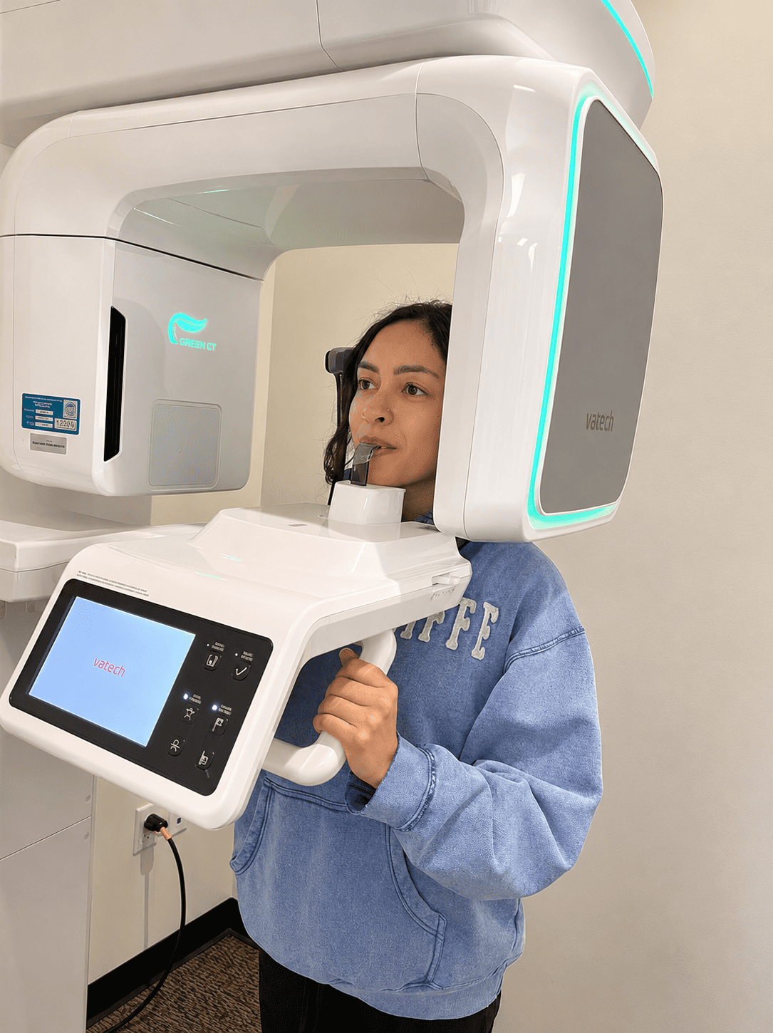 Patient undergoing a digital panoramic dental scan using advanced dental imaging technology during a diagnostic appointment