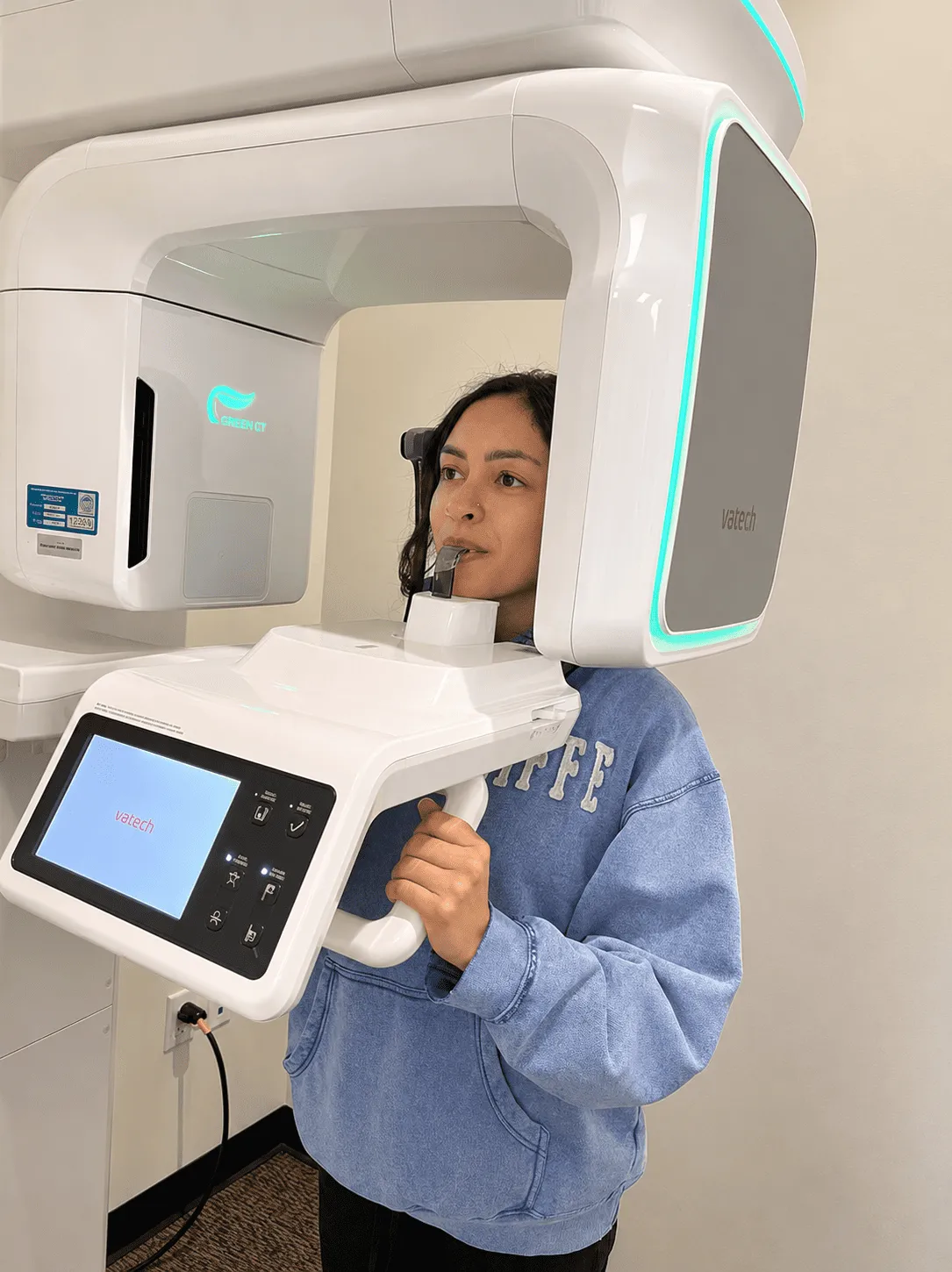 Patient undergoing a digital panoramic dental scan using advanced dental imaging technology during a diagnostic appointment