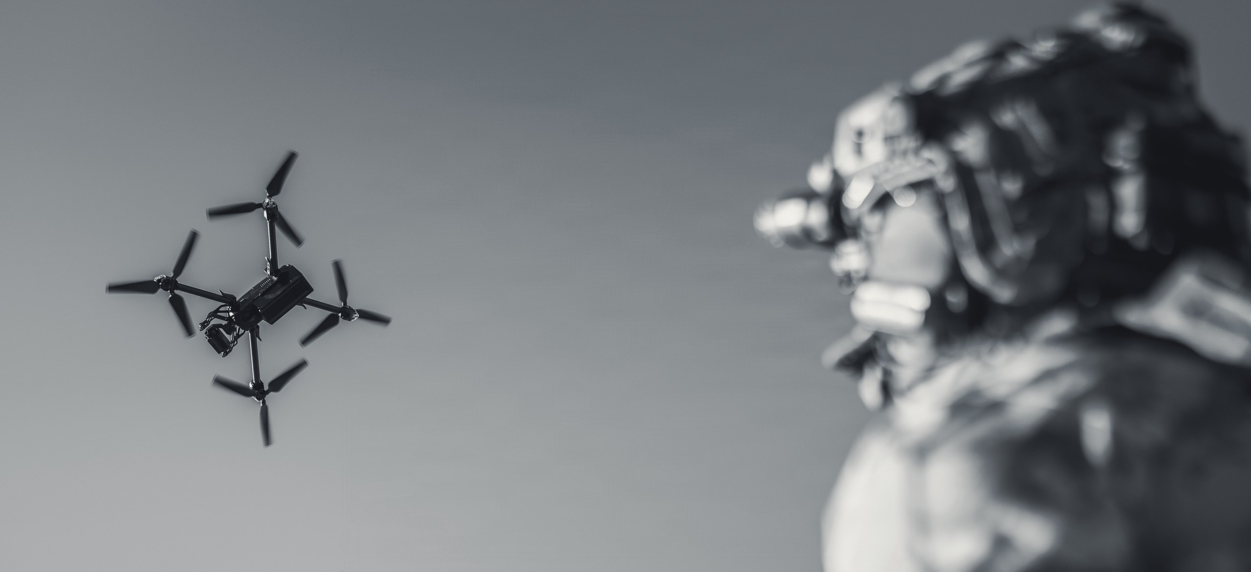Operator watching a drone in flight